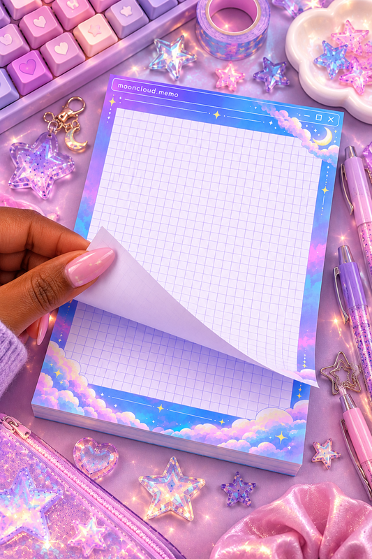 Mooncloud Memo 4x6 notepad with dreamy pastel clouds and a sleepy moon design on a stationery flat-lay